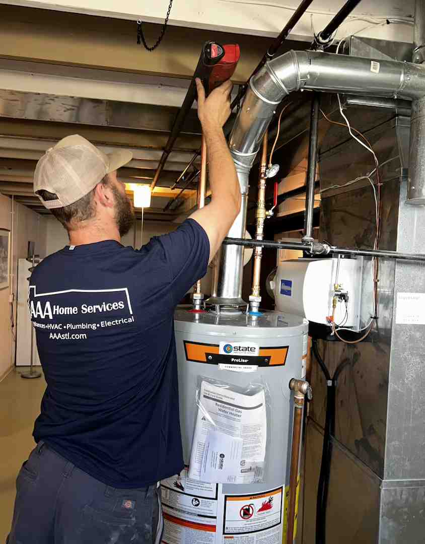 homeowner clearing path to water heater in utility room - same day water heater homeowner clearing path to water heater in utility room - same day water heater