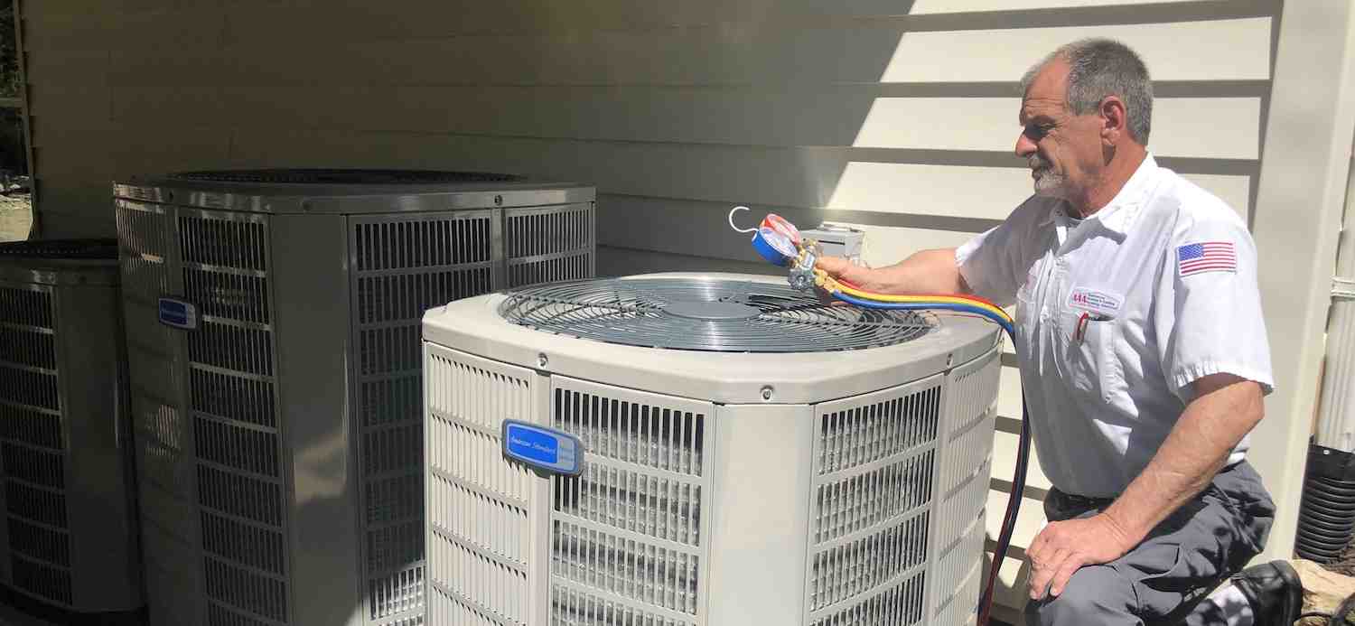 technician cleaning condenser coils - heating and air maintenance near me technician cleaning condenser coils - heating and air maintenance near me