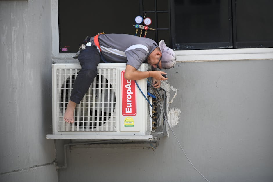 HVAC technician performing professional AC maintenance - ac unit maintenance HVAC technician performing professional AC maintenance - ac unit maintenance