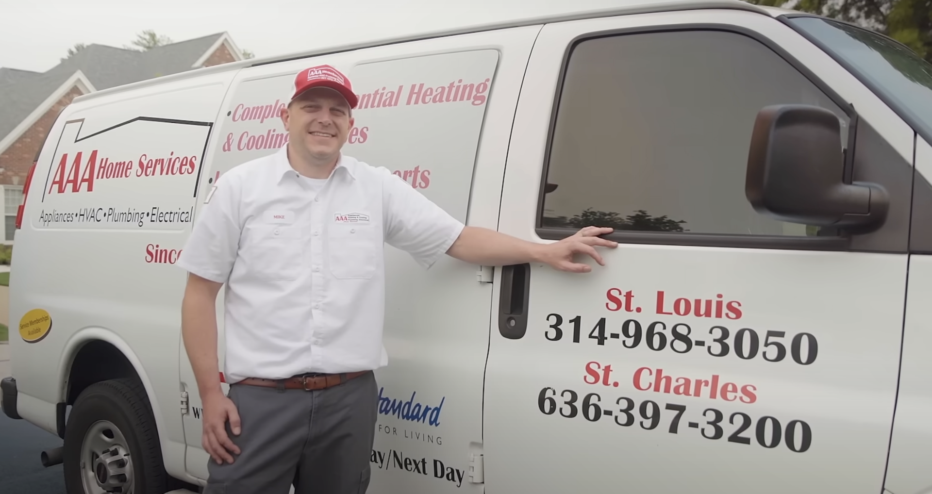 Homeowner looking at a tablet showing a high energy bill with a concerned expression - home heater replacement Homeowner looking at a tablet showing a high energy bill with a concerned expression - home heater replacement